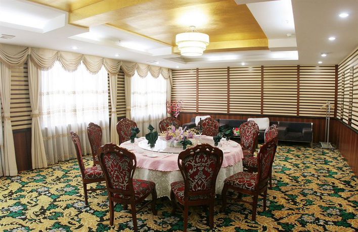 Imagen del bar/restaurante del Hotel Longjing Lihua International Hotel And Spa. Foto 7