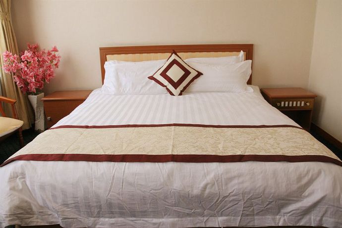 Imagen de la habitación del Hotel Longjing Lihua International Hotel And Spa. Foto 9