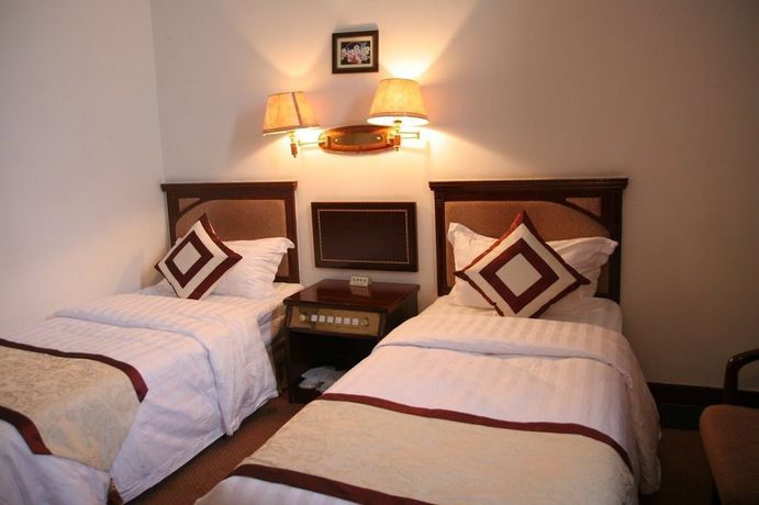 Imagen de la habitación del Hotel Longjing Lihua International Hotel And Spa. Foto 10