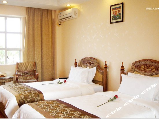 Imagen de la habitación del Hotel Longmen Natural Hotspring Resort. Foto 3