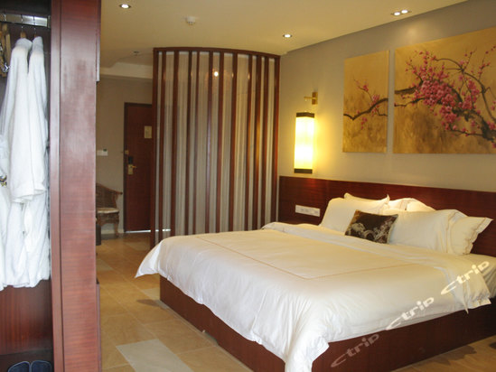 Imagen de la habitación del Hotel Longmen Natural Hotspring Resort. Foto 4