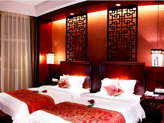 Imagen de la habitación del Hotel Longmen Natural Hotspring Resort. Foto 5