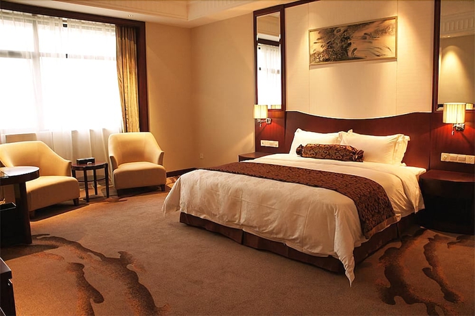 Imagen de la habitación del Hotel Longqi Jianguo. Foto 3