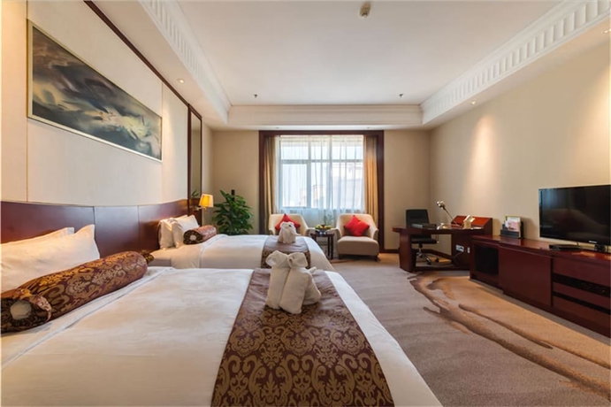 Imagen de la habitación del Hotel Longqi Jianguo. Foto 5