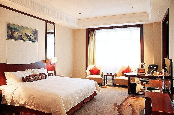 Imagen de la habitación del Hotel Longqi Jianguo. Foto 7