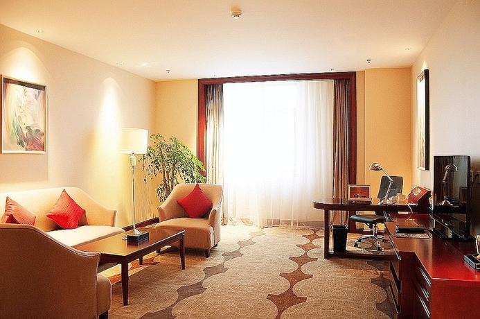 Imagen de la habitación del Hotel Longqi Jianguo. Foto 13