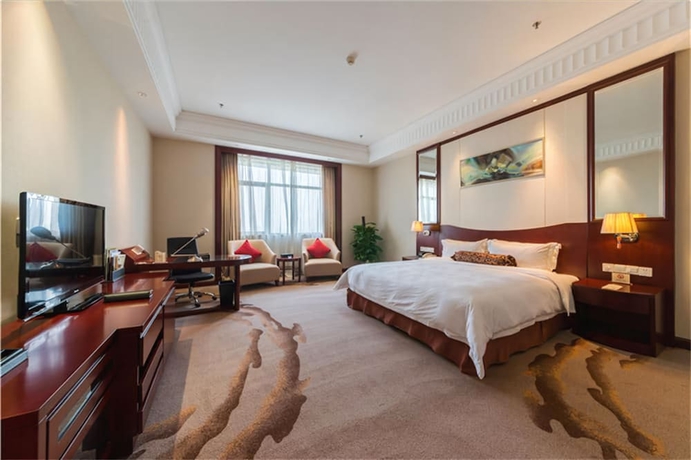 Imagen de la habitación del Hotel Longqi Jianguo. Foto 14