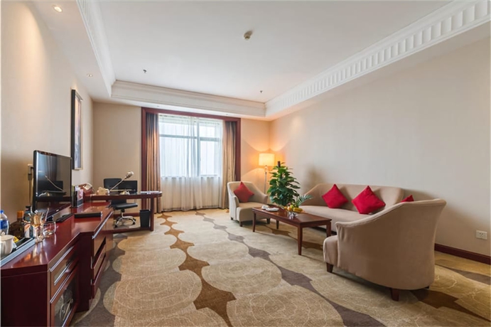 Imagen de la habitación del Hotel Longqi Jianguo. Foto 15