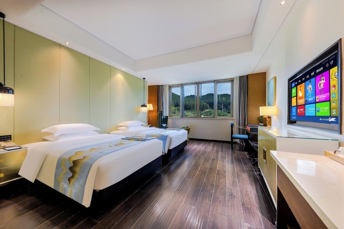 Imagen de la habitación del Hotel Longquan Jinsha Hotspring. Foto 5