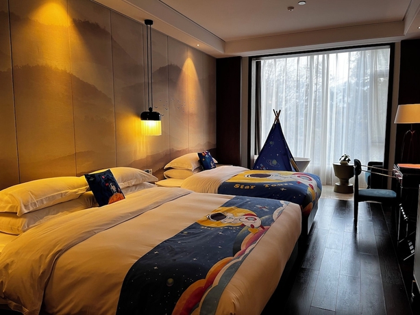 Imagen de la habitación del Hotel Longquan Jinsha Hotspring. Foto 9