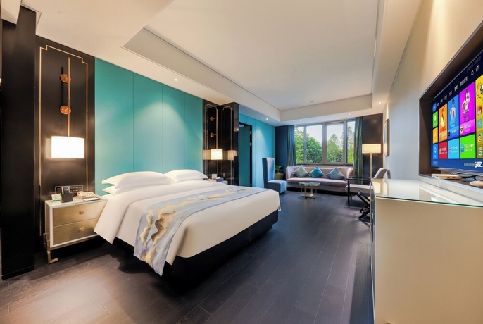 Imagen de la habitación del Hotel Longquan Jinsha Hotspring. Foto 10