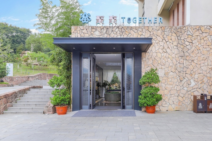 Imagen del bar/restaurante del Hotel Longquan Jinsha Hotspring. Foto 3