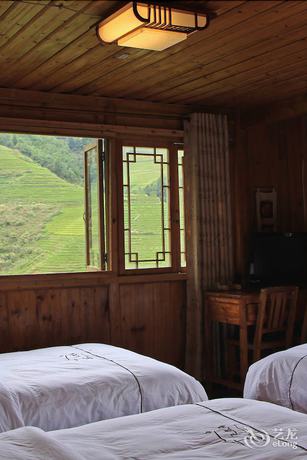 Imagen de la habitación del Hotel Longsheng Dazhai Tian Ranju Inn. Foto 4
