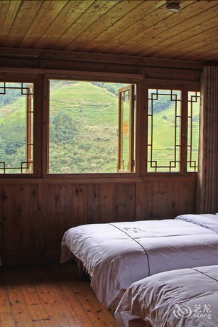 Imagen de la habitación del Hotel Longsheng Dazhai Tian Ranju Inn. Foto 8