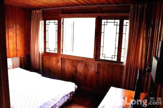 Imagen de la habitación del Hotel Longsheng Dazhai Tian Ranju Inn. Foto 15