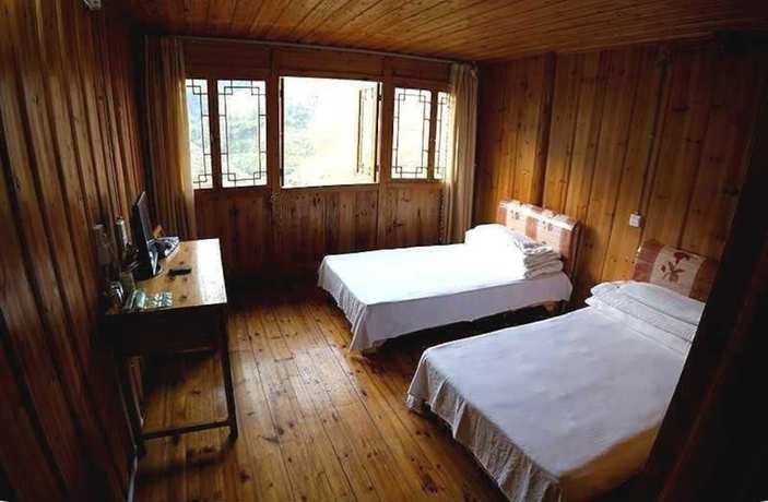 Imagen de la habitación del Hotel Longsheng Dazhai Tian Ranju Inn. Foto 17