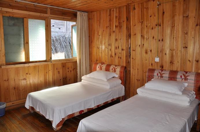 Imagen de la habitación del Hotel Longsheng Dazhai Tian Ranju Inn. Foto 19