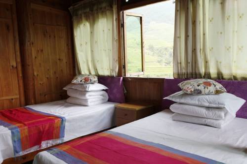 Imagen de la habitación del Hotel Longsheng Golden Dragon Country Villa. Foto 1