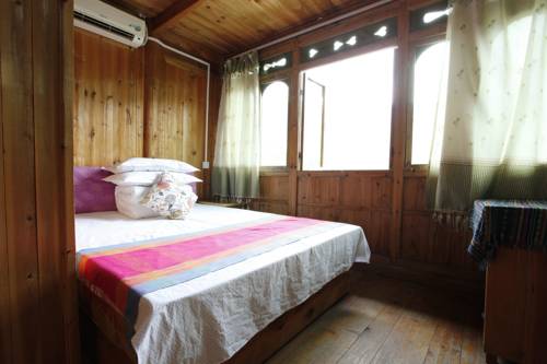 Imagen de la habitación del Hotel Longsheng Golden Dragon Country Villa. Foto 3