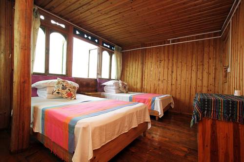 Imagen de la habitación del Hotel Longsheng Golden Dragon Country Villa. Foto 6