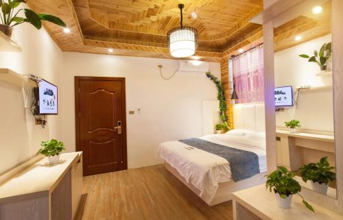 Imagen general del Hotel Longsheng Longji Puchuo Shengxiang Art. Foto 2