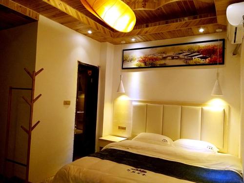 Imagen de la habitación del Hotel Longsheng Longji Puchuo Shengxiang Art. Foto 7