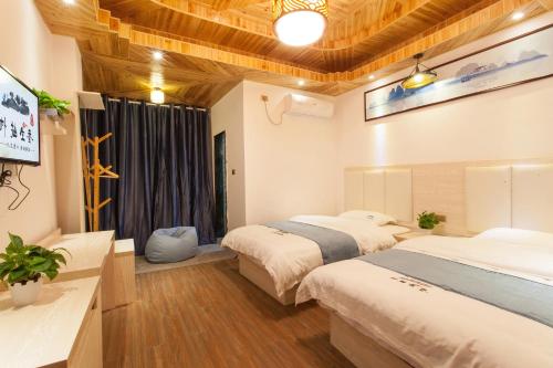 Imagen general del Hotel Longsheng Longji Puchuo Shengxiang Art. Foto 3