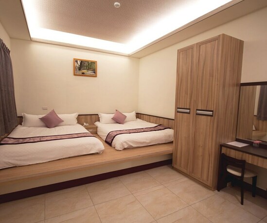 Imagen de la habitación del Hotel Longxing Bandb. Foto 19