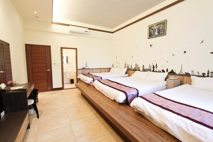 Imagen de la habitación del Hotel Longxing Bandb. Foto 27