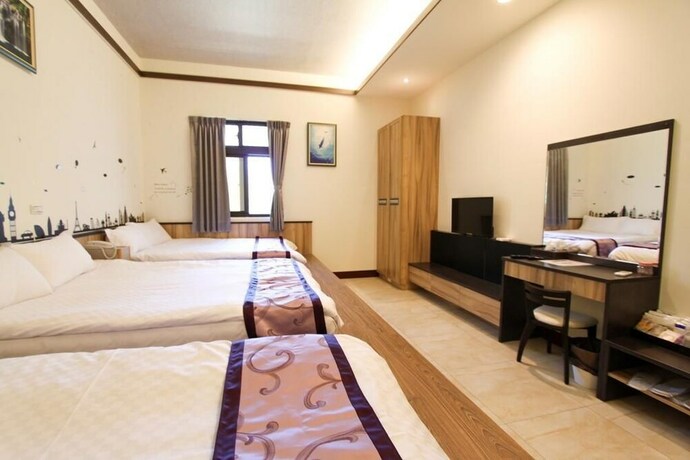 Imagen de la habitación del Hotel Longxing Bandb. Foto 28