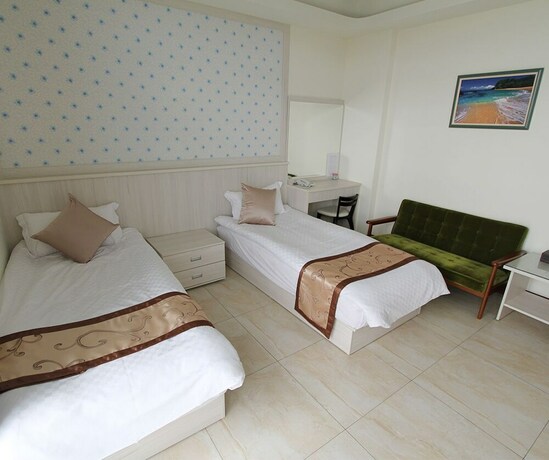 Imagen de la habitación del Hotel Longxing Bandb. Foto 31