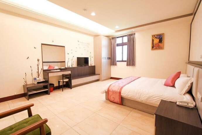 Imagen de la habitación del Hotel Longxing Bandb. Foto 32