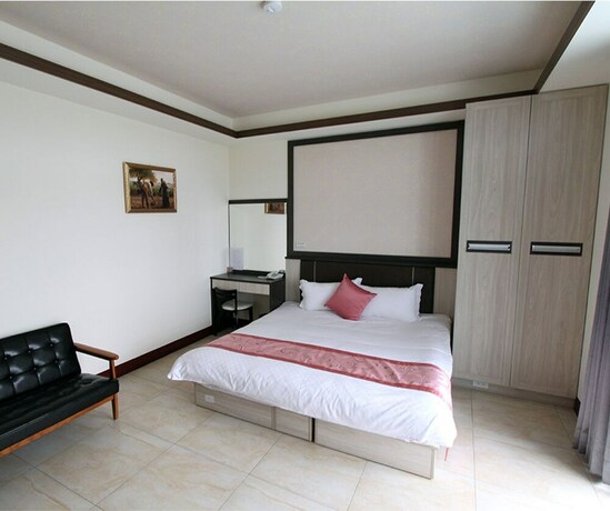 Imagen de la habitación del Hotel Longxing Bandb. Foto 34