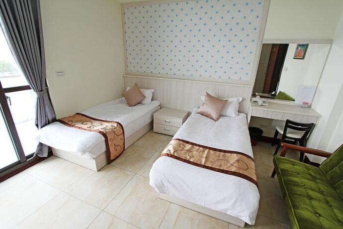 Imagen de la habitación del Hotel Longxing Bandb. Foto 37