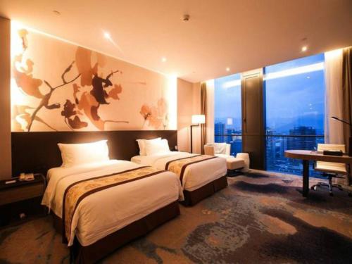 Imagen de la habitación del Hotel Longyan Jinhua Fliport. Foto 5