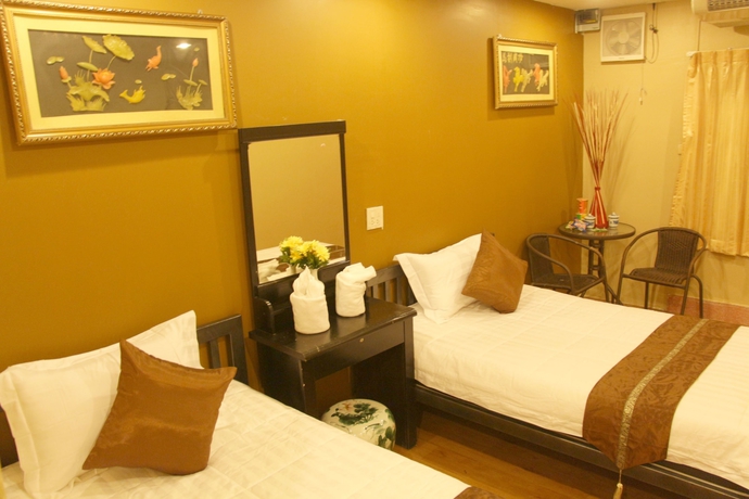 Imagen de la habitación del Hotel Longzhu Guesthouse. Foto 3