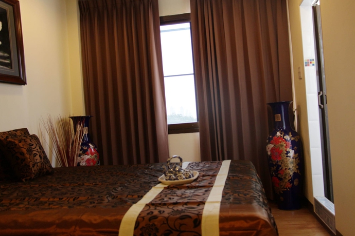 Imagen de la habitación del Hotel Longzhu Guesthouse. Foto 5