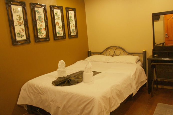 Imagen de la habitación del Hotel Longzhu Guesthouse. Foto 6