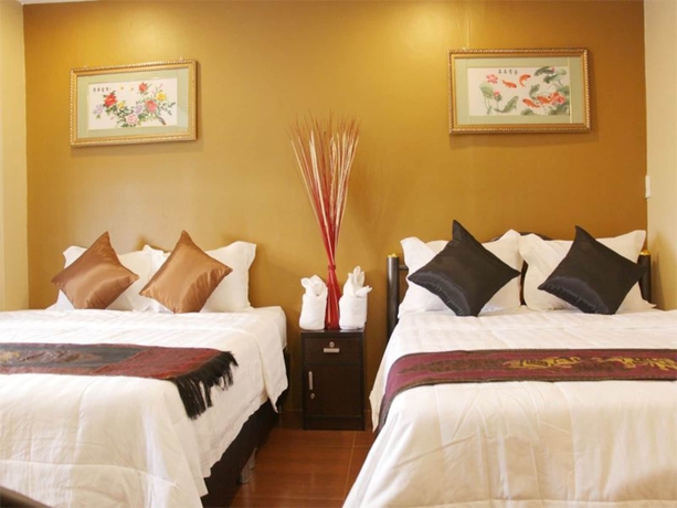 Imagen de la habitación del Hotel Longzhu Guesthouse. Foto 7