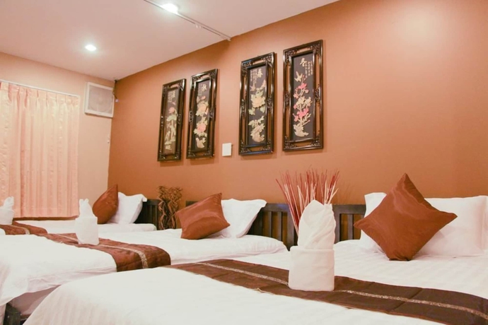 Imagen de la habitación del Hotel Longzhu Guesthouse. Foto 9