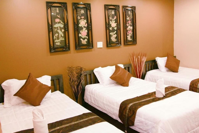 Imagen de la habitación del Hotel Longzhu Guesthouse. Foto 11