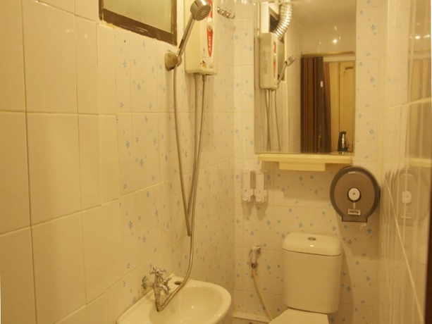 Imagen de la habitación del Hotel Longzhu Guesthouse. Foto 13