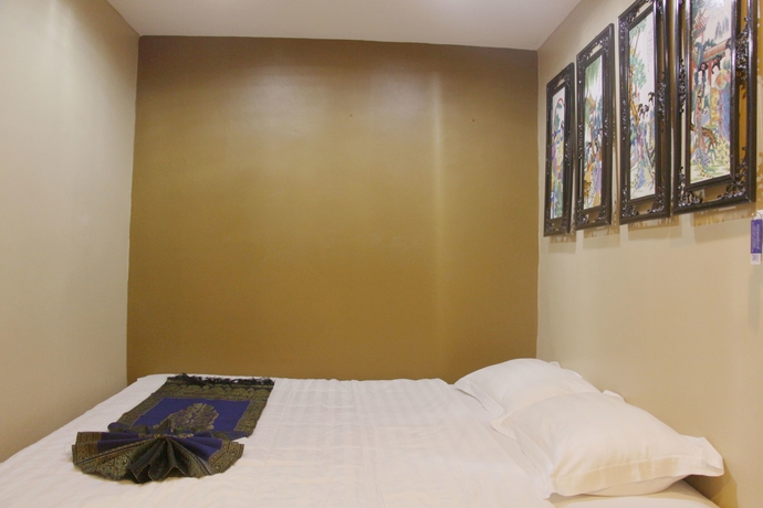 Imagen de la habitación del Hotel Longzhu Guesthouse. Foto 17