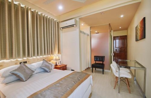 Imagen de la habitación del Hotel Lonuveli. Foto 9