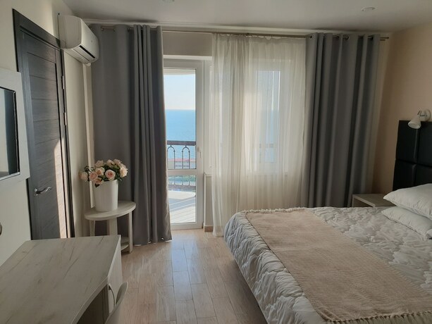 Imagen de la habitación del Hotel Loofki. Foto 16