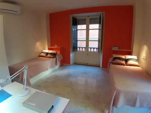 Imagen de la habitación del Hotel Loop Homes Palace Granada. Foto 18