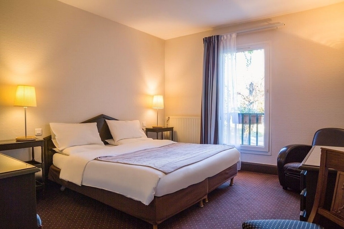 Imagen de la habitación del Hotel L'orangerie Du Chateau Des Reynats. Foto 7