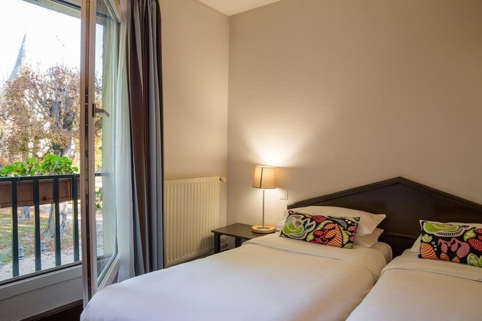 Imagen de la habitación del Hotel L'orangerie Du Chateau Des Reynats. Foto 10