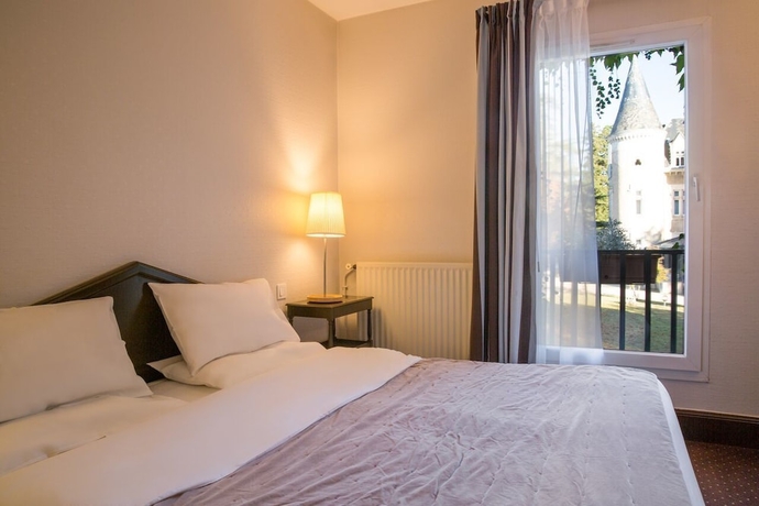 Imagen de la habitación del Hotel L'orangerie Du Chateau Des Reynats. Foto 11