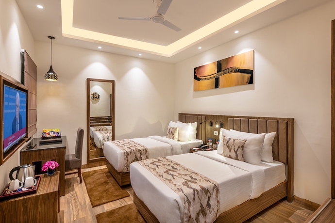 Imagen de la habitación del Hotel Lords Eco Inn Dehradun. Foto 9